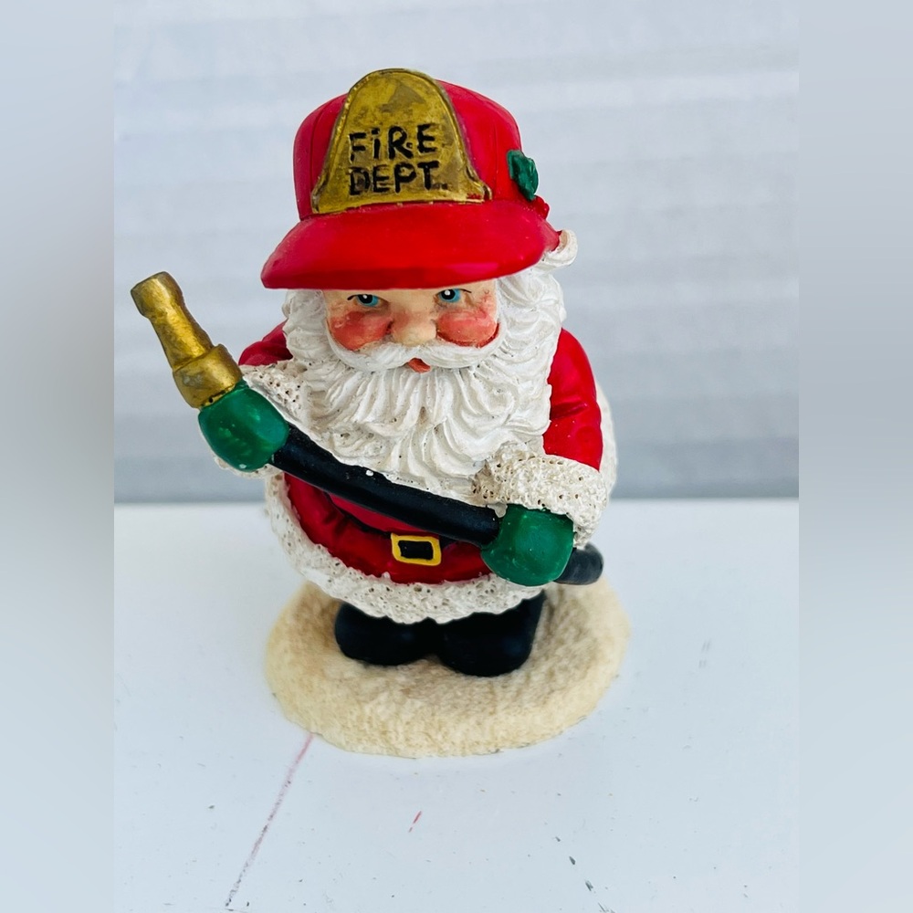 1993 Morehead  Figurine Santa Fireman w/Firehose Company